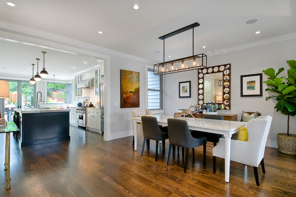 Transitional kitchen/dining combo in San Francisco with grey walls, medium hardwood floors and no fireplace.