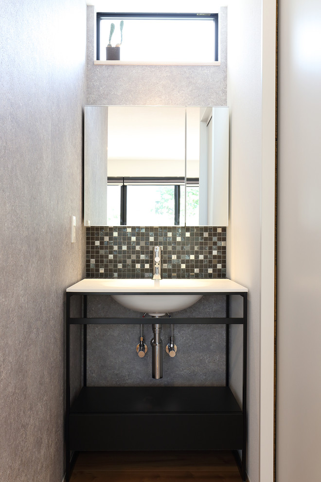 Inspiration for a modern powder room in Other.