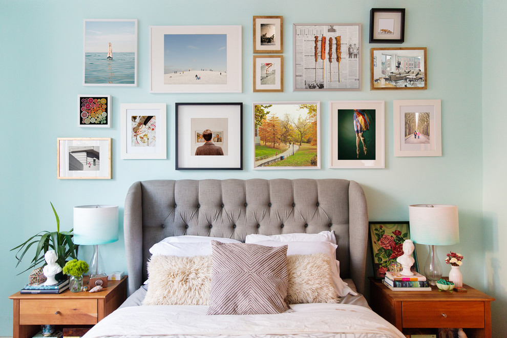 Eclectic bedroom in New York with blue walls.