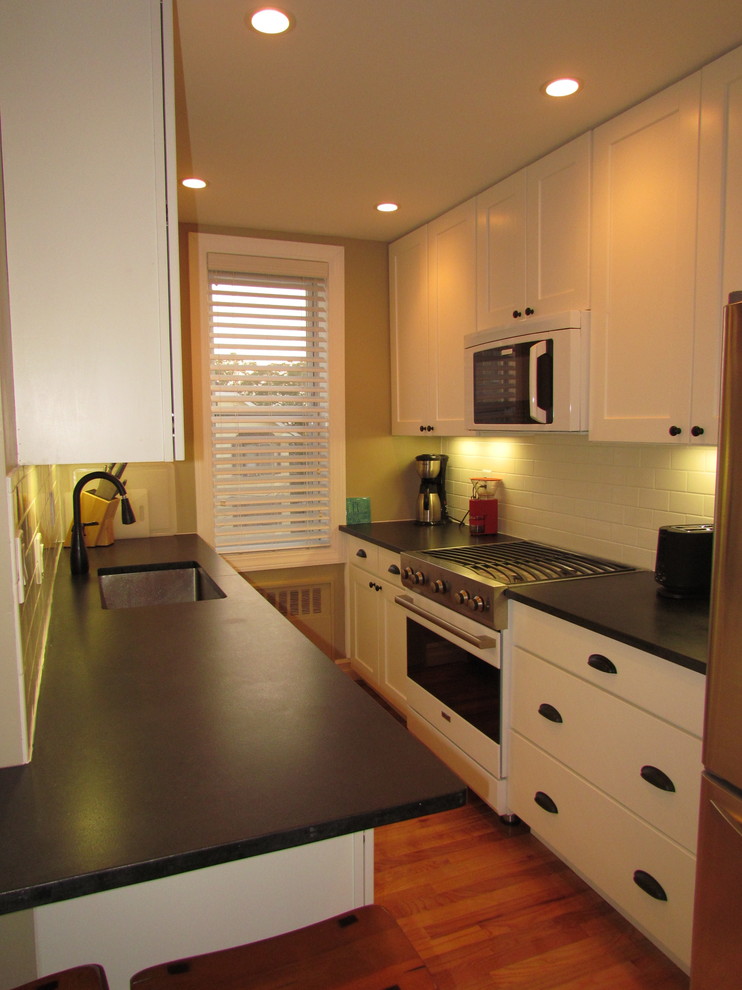 This is an example of a beach style kitchen in New York.