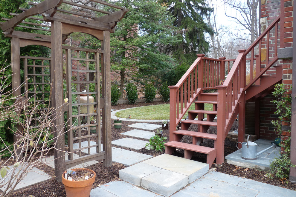 Mid-sized transitional side yard stone partial sun entryway photo for fall in DC Metro