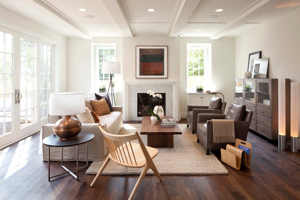 Inspiration for a large contemporary living room in Minneapolis with white walls, a standard fireplace and no tv.