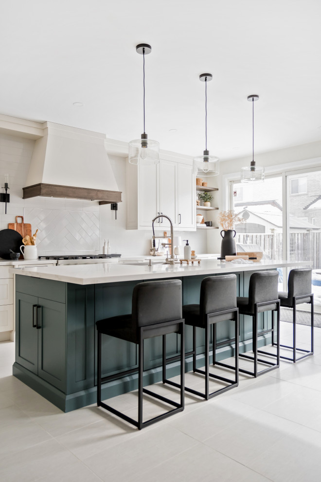 Example of a transitional kitchen design in Toronto