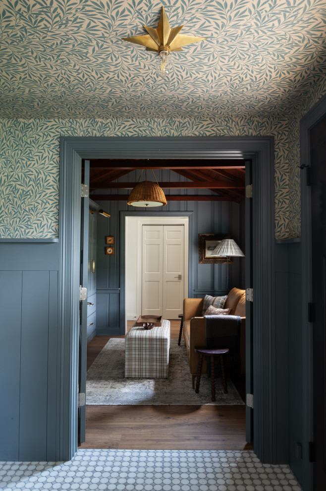 Example of a transitional wallpaper entryway design