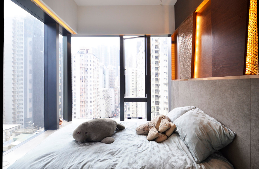 Design ideas for a small contemporary kids' room in Hong Kong with blue walls, ceramic floors and grey floor.