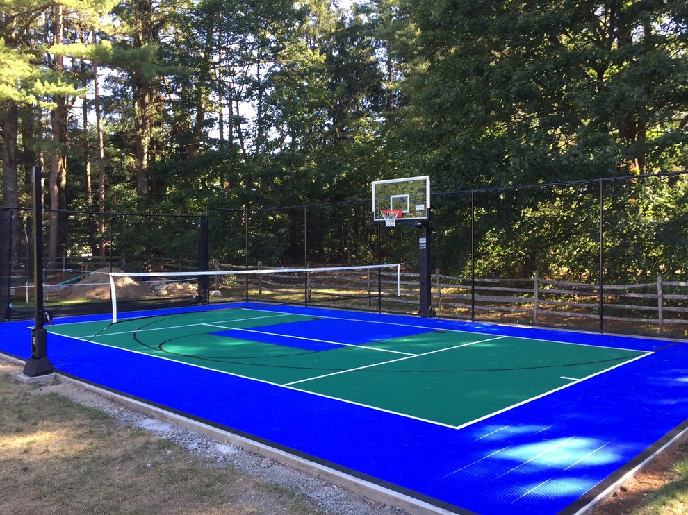 Design ideas for a mid-sized traditional backyard partial sun outdoor sport court in Boston with with outdoor playset and concrete pavers.