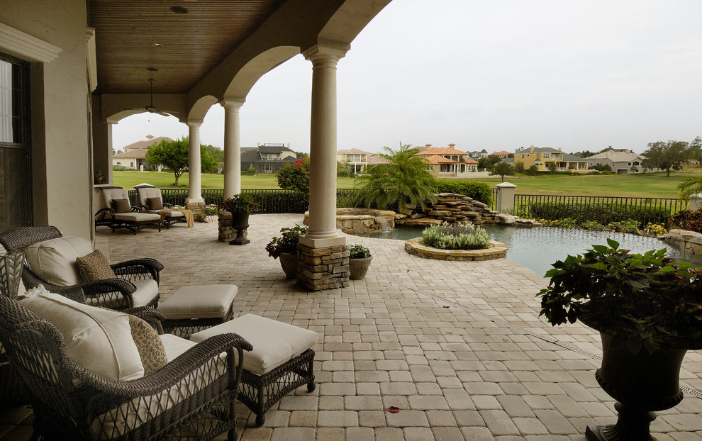 Inspiration for a large mediterranean patio in Tampa.