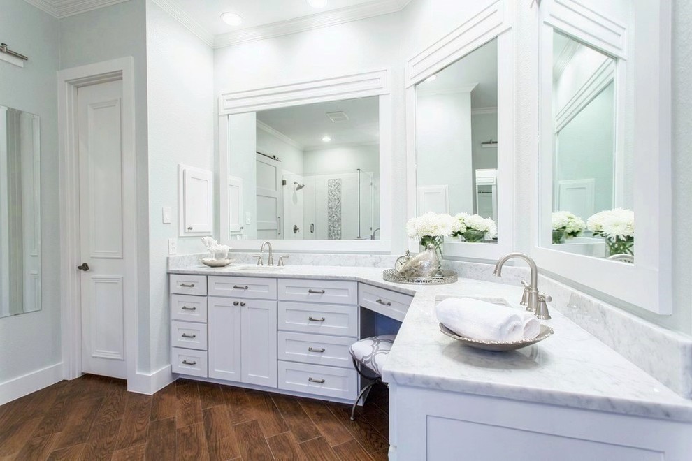 Photo of a classic ensuite bathroom in Dallas with a submerged sink, shaker cabinets, white cabinets, marble worktops, a freestanding bath, white tiles, porcelain tiles, blue walls and porcelain flooring.