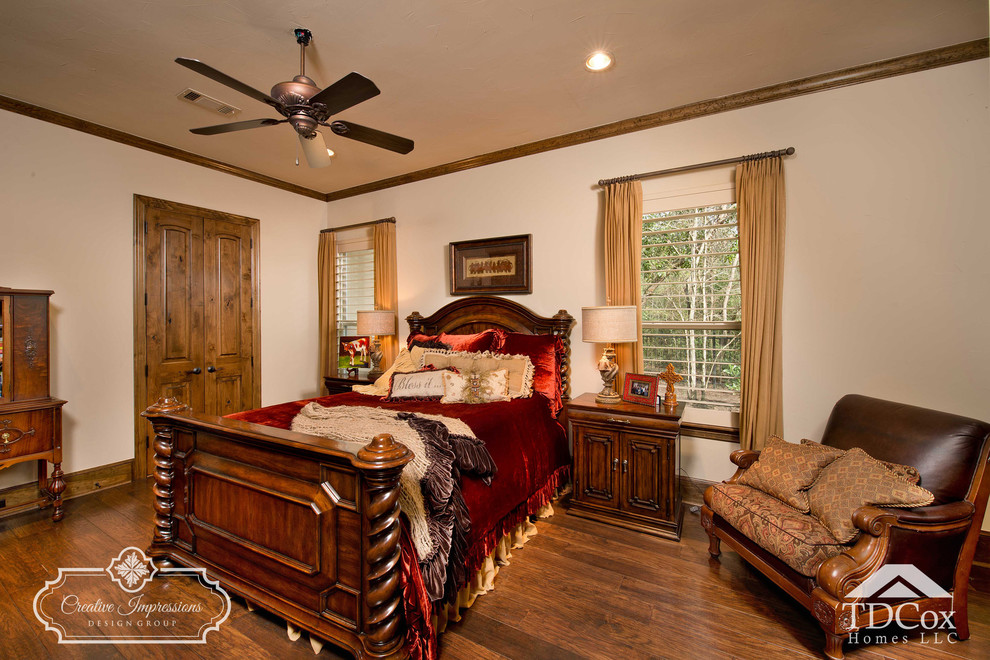 Inspiration for a rustic bedroom remodel in Houston