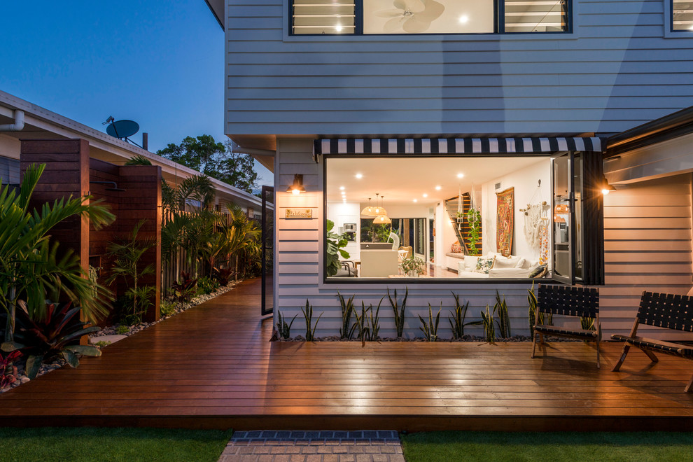 This is an example of a contemporary backyard deck in Gold Coast - Tweed with no cover.