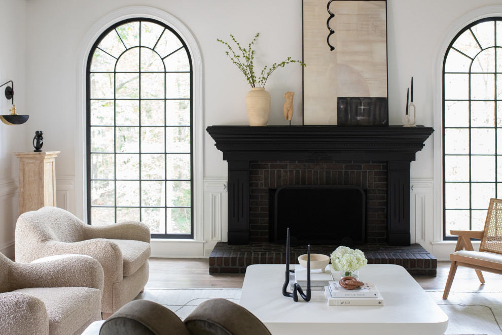 Photo of a medium sized traditional open plan living room in Atlanta with white walls, marble flooring, a standard fireplace, a brick fireplace surround, white floors and exposed beams.