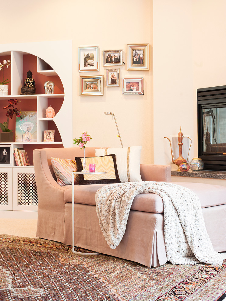 Inspiration for a large eclectic master carpeted bedroom remodel with beige walls