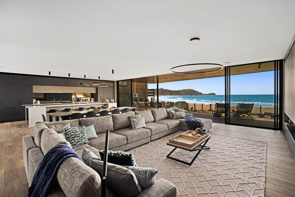 Inspiration for a large contemporary formal open concept living room in Central Coast with a wall-mounted tv.