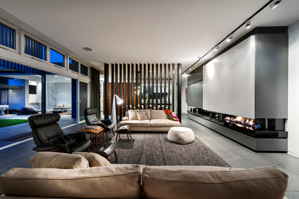 Contemporary living room in Perth with grey walls and a ribbon fireplace.