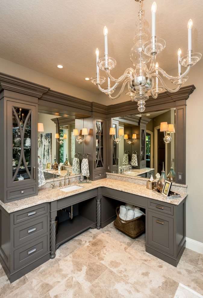 Large transitional master bathroom in Other with shaker cabinets, brown cabinets, a freestanding tub, an open shower, beige walls, limestone floors, an undermount sink and granite benchtops.