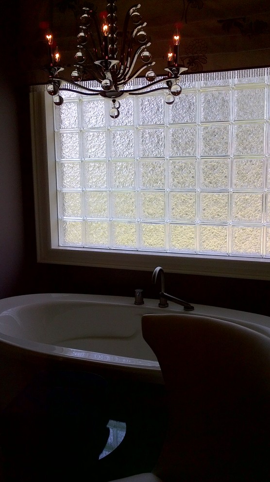 Example of a mid-sized transitional home design design in Toronto with beige walls