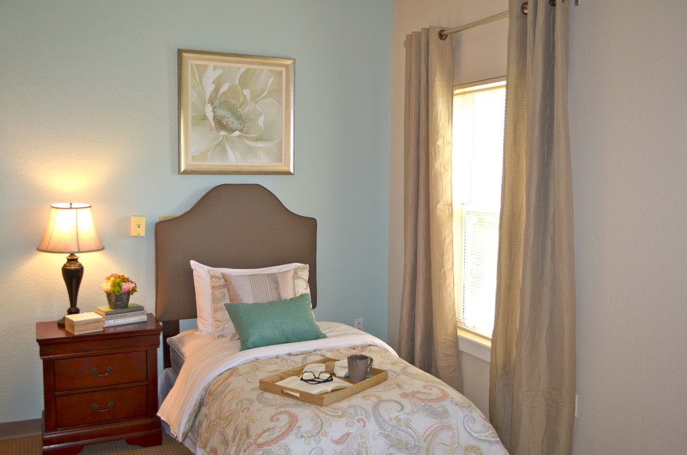 Inspiration for a mid-sized transitional master bedroom in Albuquerque with white walls and carpet.