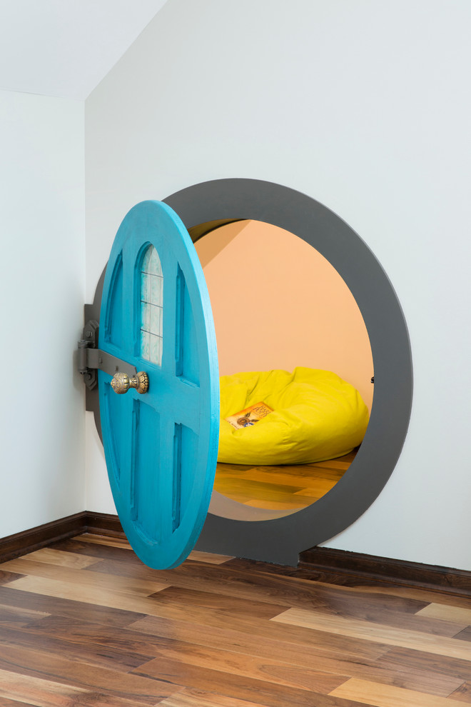 Attic master suite with a Hobbit Hole - We took this unfinished attic and turned it into a master suite full of whimsical touches. There is a round Hobbit Hole door that leads to a play room for the kids, a rope swing and 2 secret bookcases that are opened when you pull the secret Harry Potter books.