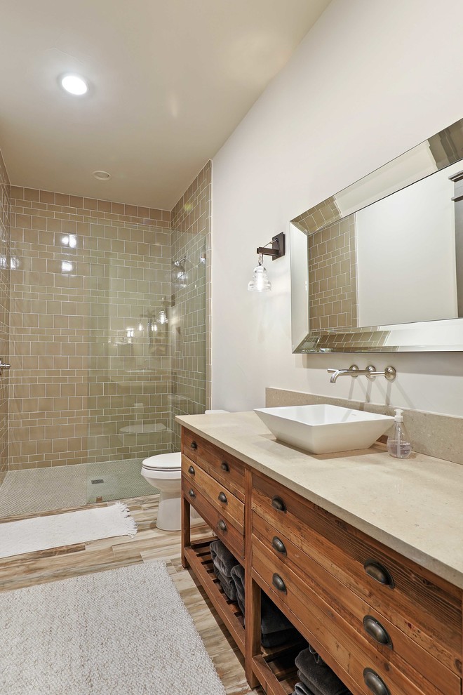 Inspiration for an expansive country kids bathroom in Austin with furniture-like cabinets, brown cabinets, an open shower, white tile, marble, white walls, ceramic floors, a vessel sink, quartzite benchtops, multi-coloured floor and an open shower.