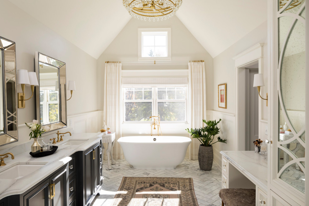 Example of a large transitional master porcelain tile, white floor, double-sink and vaulted ceiling bathroom design in Minneapolis with beaded inset cabinets, dark wood cabinets, a one-piece toilet, white walls, an undermount sink, marble countertops, a hinged shower door, white countertops and a built-in vanity