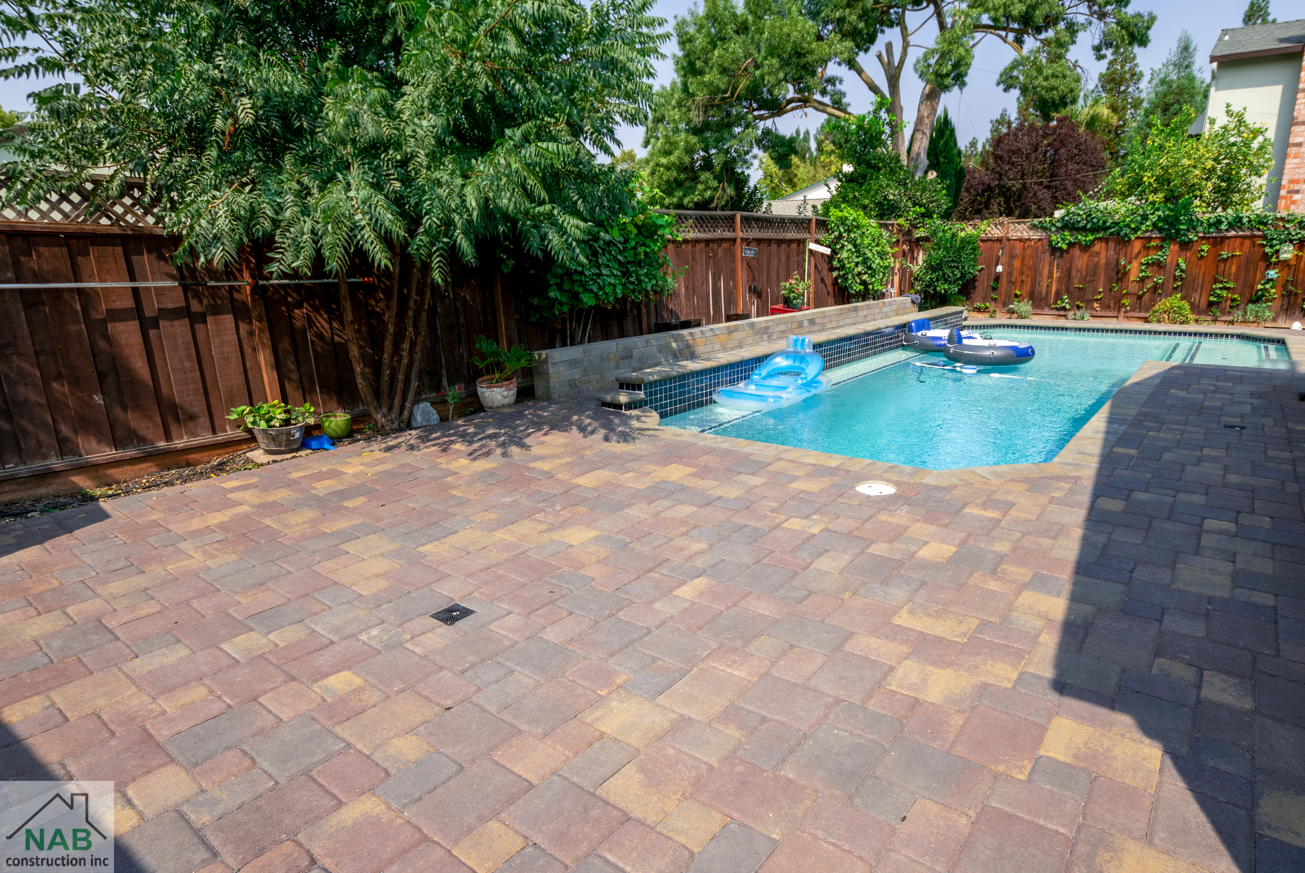 Pavers, lawn, pergola, and retaining wall installation in Pleasanton, CA