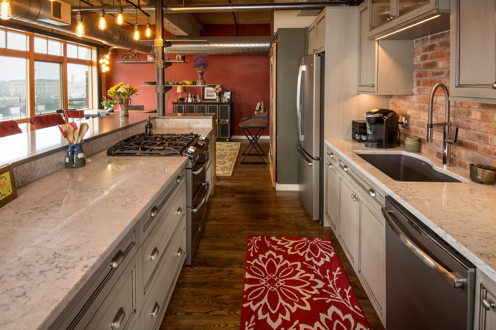 Open concept kitchen - large rustic open concept kitchen idea with quartz countertops