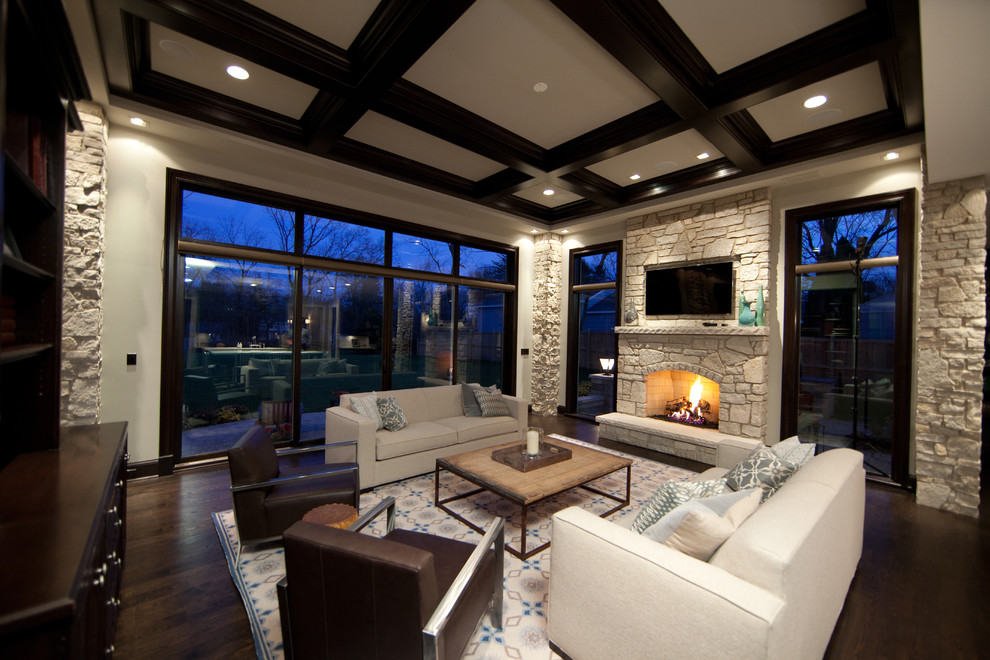Design ideas for a large contemporary formal open concept living room in Chicago with beige walls, dark hardwood floors, a standard fireplace, a stone fireplace surround and a wall-mounted tv.