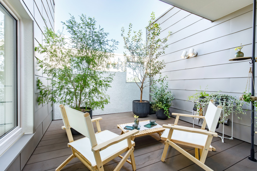Design ideas for a scandinavian terrace in Other with feature lighting.