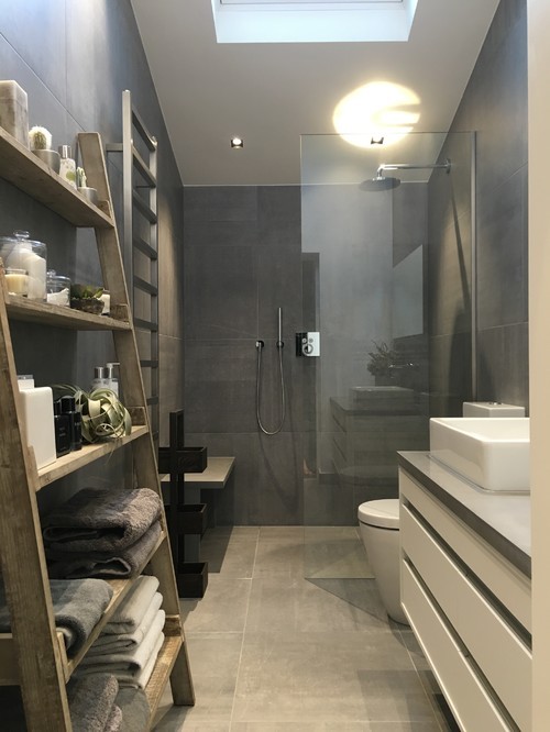 Photo of an industrial bathroom in Sydney with gray tile, porcelain tile and porcelain floors.