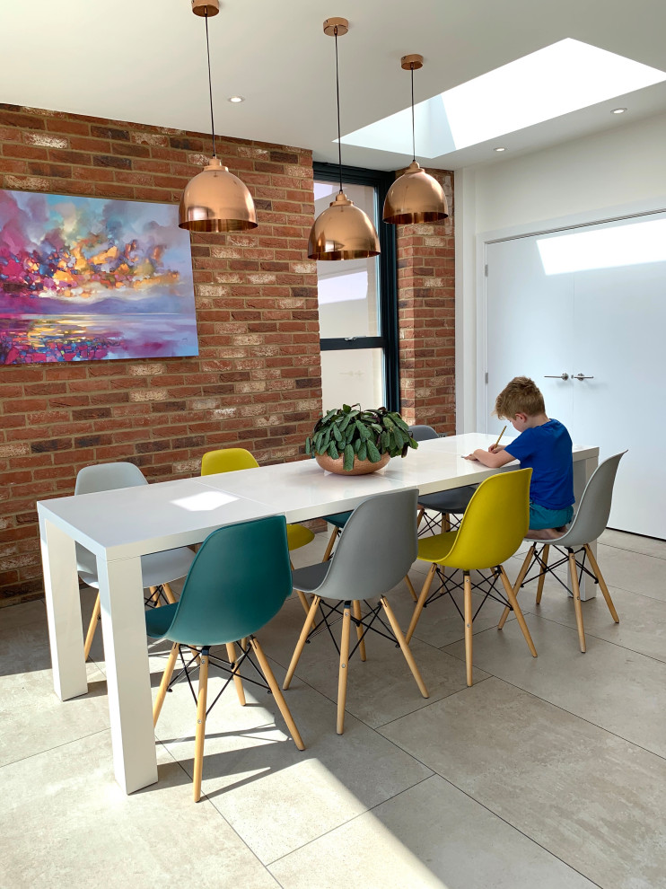 This is an example of a contemporary dining room in Essex.