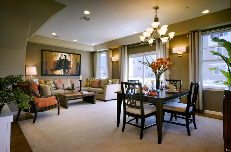 This is an example of a contemporary family room in New York.