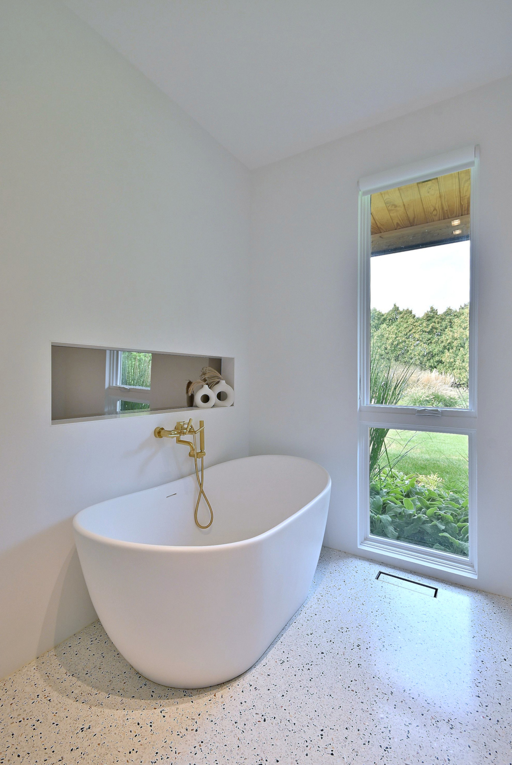 Mid-Century Modern Bathroom with Freestanding Tub