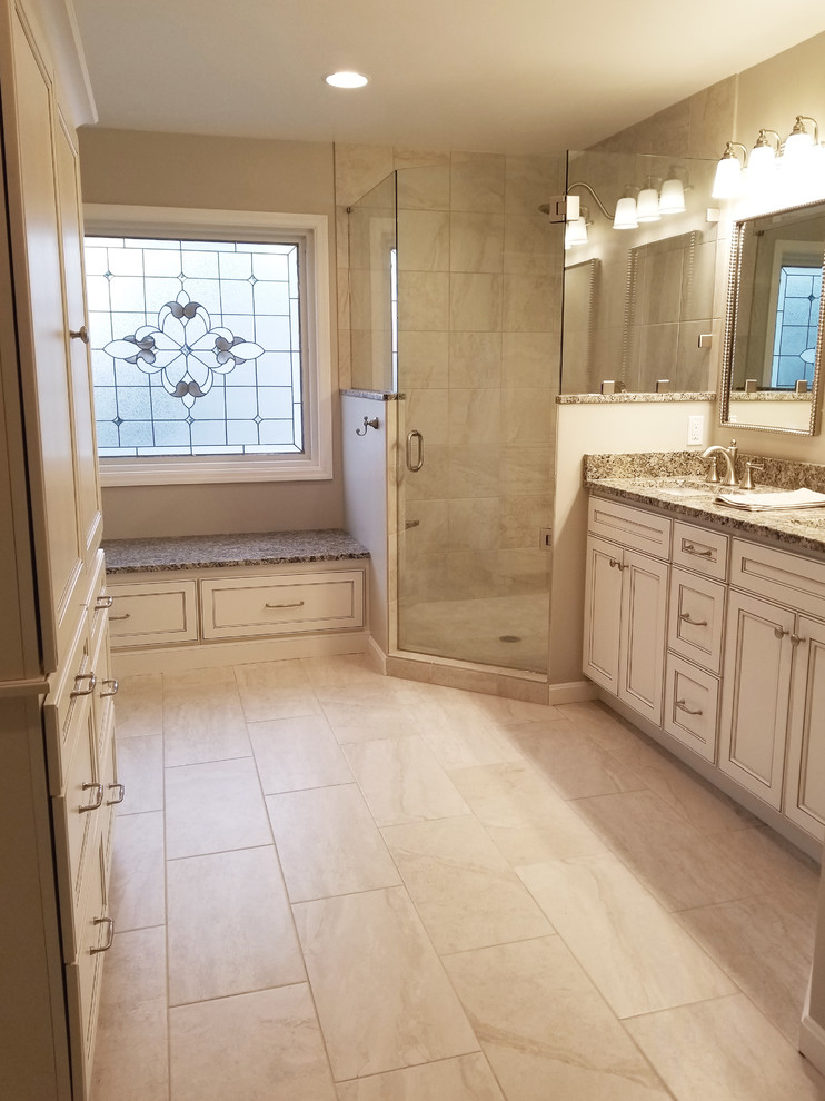 Large transitional master ceramic tile and beige floor open shower photo in Cincinnati with flat-panel cabinets, white cabinets and granite countertops