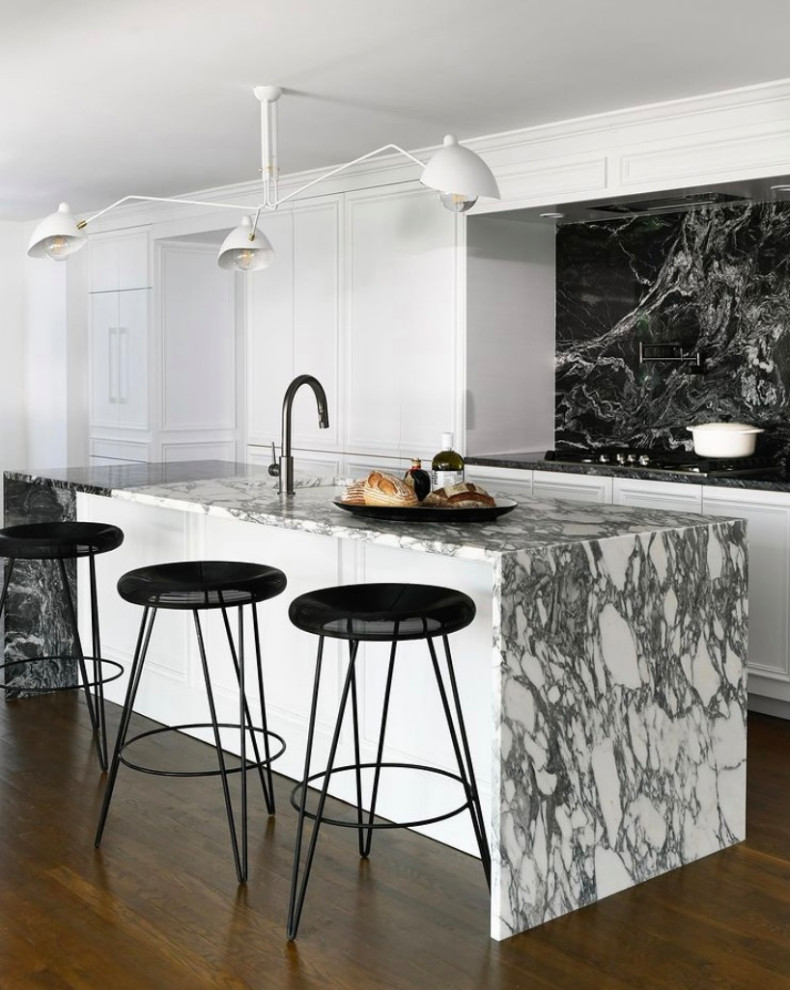 Minimalist kitchen photo in Other with black backsplash and granite backsplash