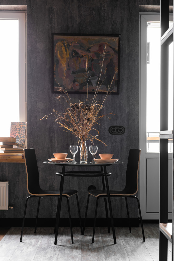 Design ideas for a small industrial dining room in Other.