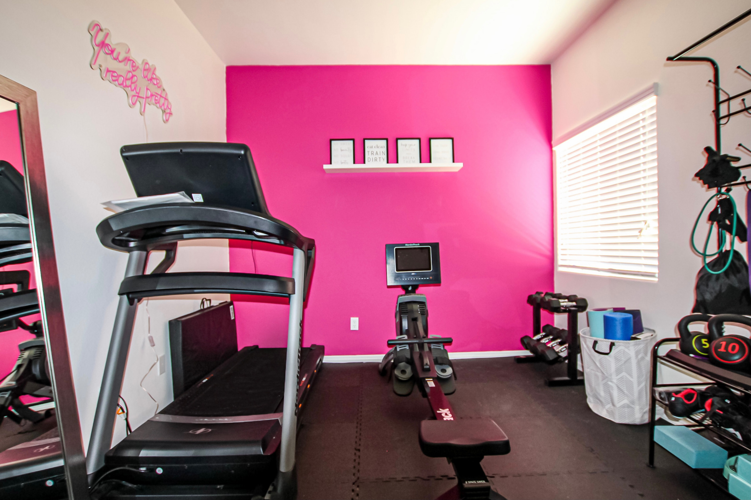 Premium Photo  A pink gym with a pink wall that says  pink  on it.