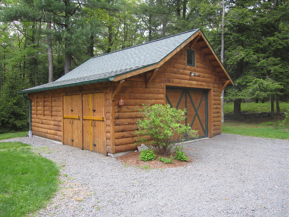 Mid-sized mountain style brown one-story wood gable roof photo