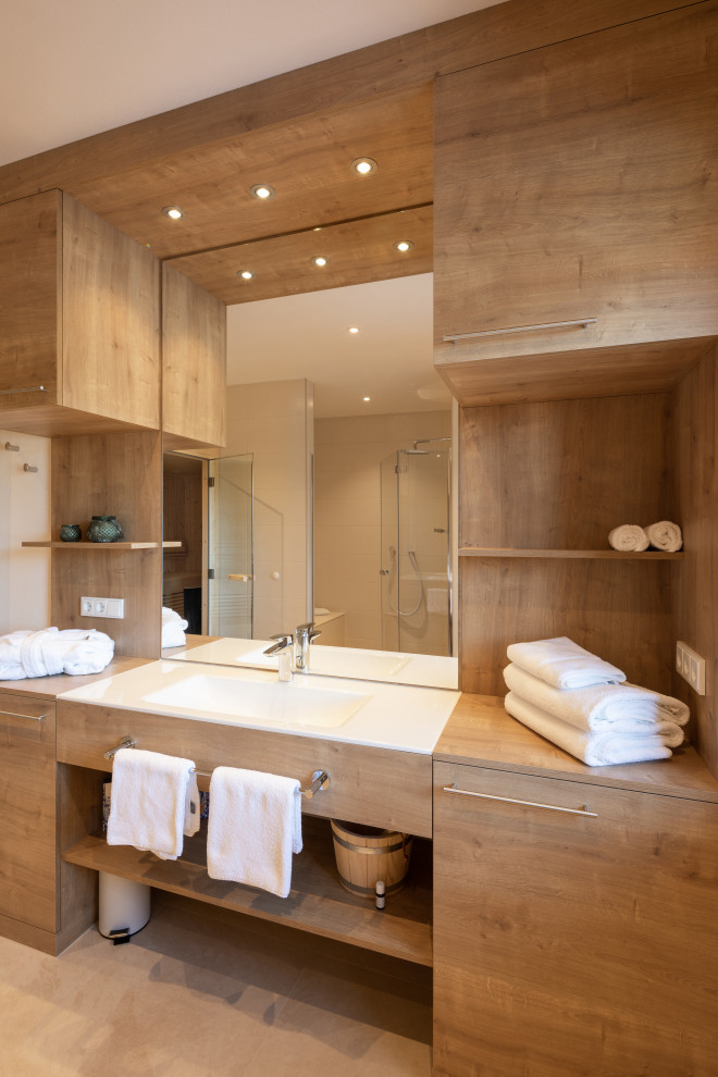 Inspiration for a mid-sized country master bathroom in Other with flat-panel cabinets, light wood cabinets, a corner shower, white walls, porcelain floors, an integrated sink, wood benchtops, beige floor, beige benchtops, a single vanity and a built-in vanity.