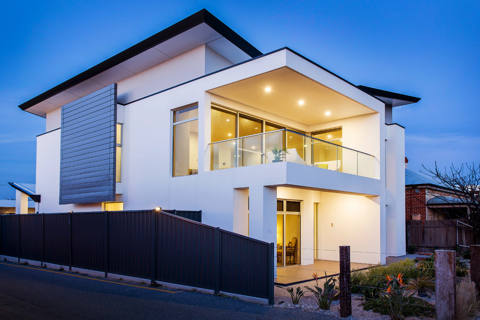 Design ideas for a large contemporary two-storey white exterior in Adelaide with metal siding.