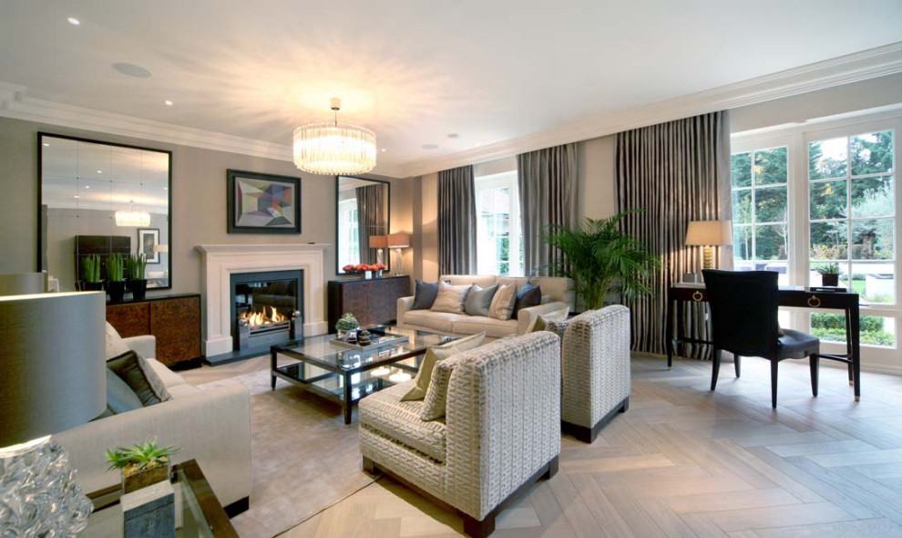 Example of a large eclectic formal and enclosed light wood floor, gray floor and wallpaper living room design in Other with beige walls, a standard fireplace, a stone fireplace and no tv