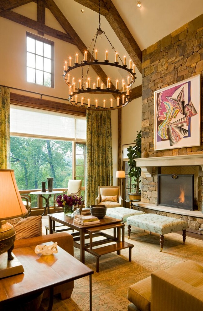 Photo of a large arts and crafts formal open concept living room in Denver with white walls, medium hardwood floors, a standard fireplace, a stone fireplace surround, no tv and brown floor.