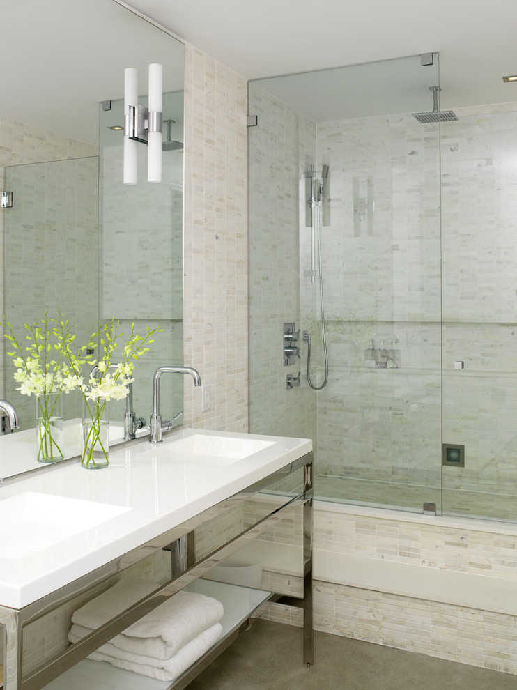 This is an example of a mid-sized industrial master bathroom in Toronto with a console sink, open cabinets, white cabinets, an open shower, a wall-mount toilet, white tile, mosaic tile, white walls, concrete floors, solid surface benchtops and grey floor.