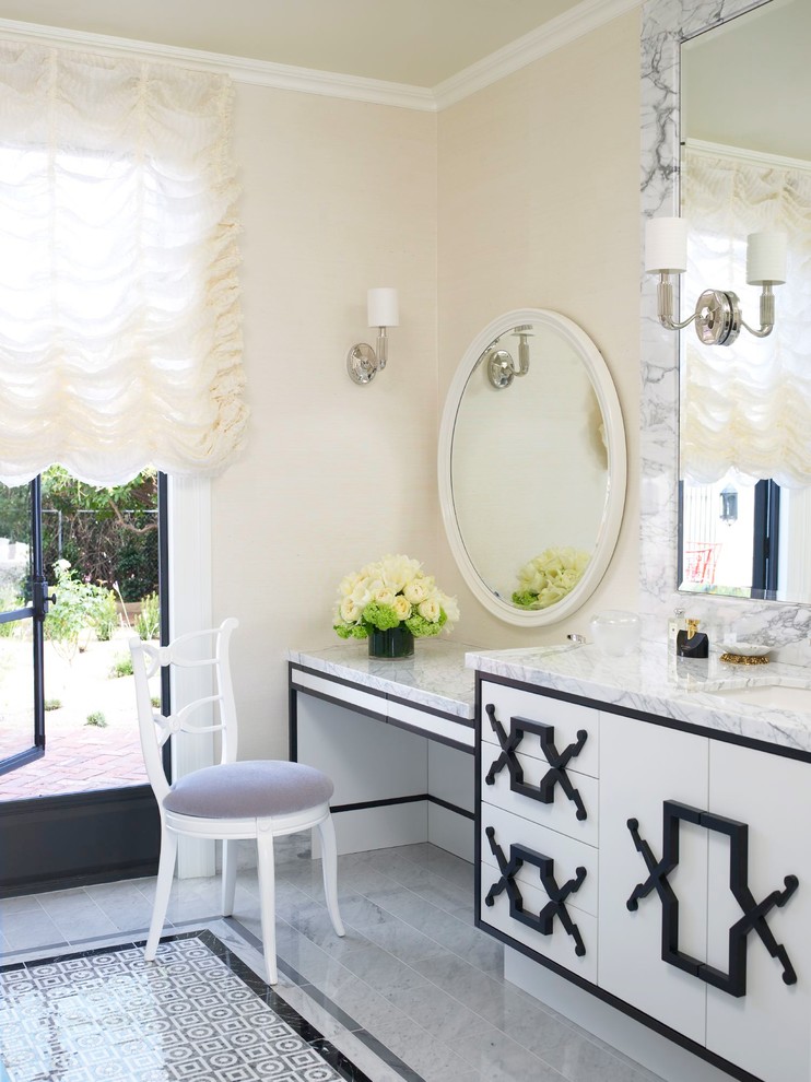 Inspiration for a contemporary bathroom in Miami with flat-panel cabinets.
