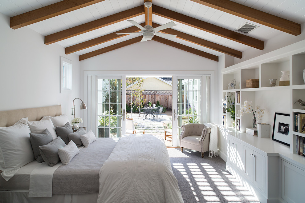 Mid-sized country master bedroom in San Francisco with white walls and carpet.
