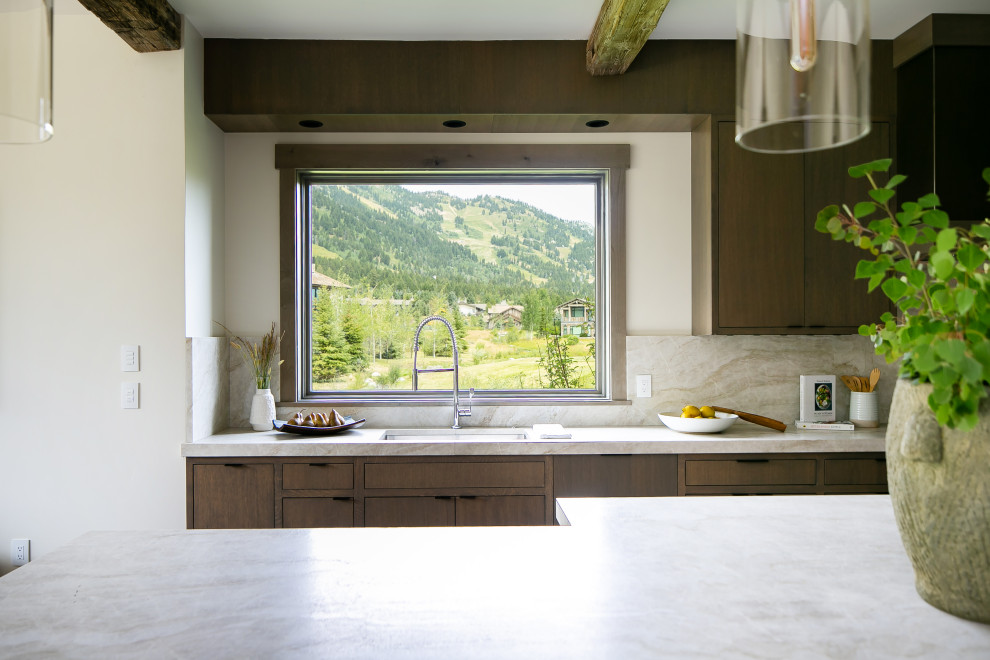 Mountain style kitchen photo in Jackson with an island