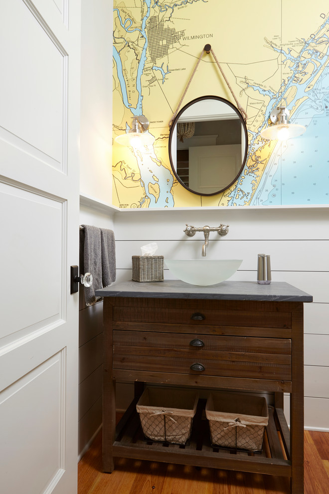 Beach style powder room in Other.