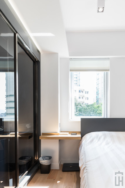 Example of a trendy home design design in Hong Kong