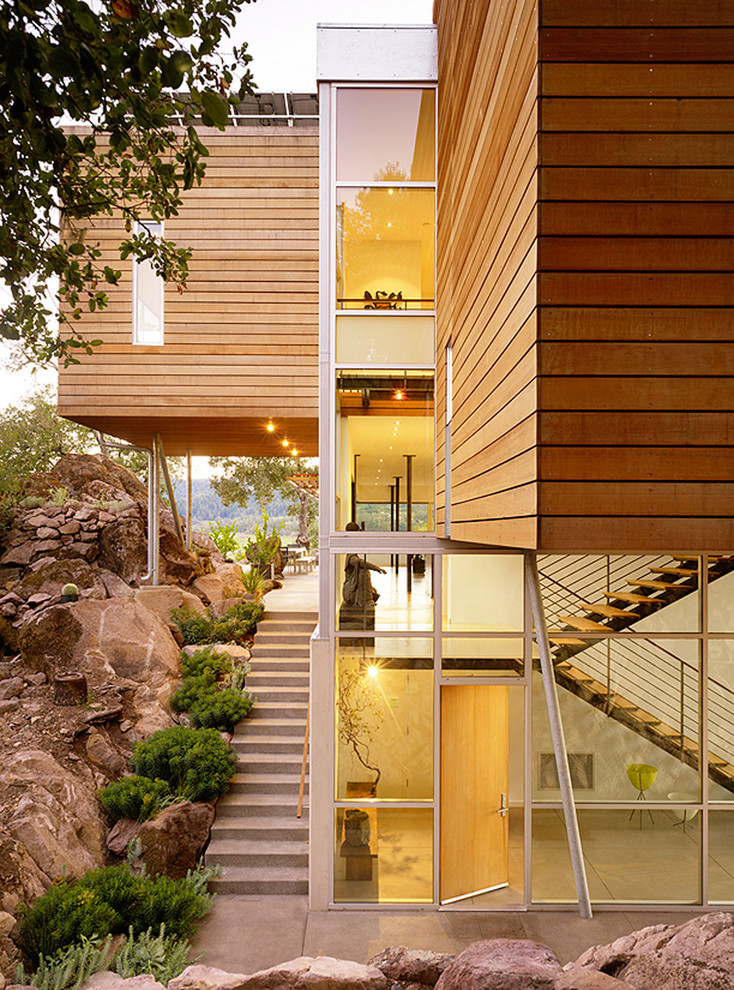 This is an example of a contemporary three-storey exterior in San Francisco with wood siding.