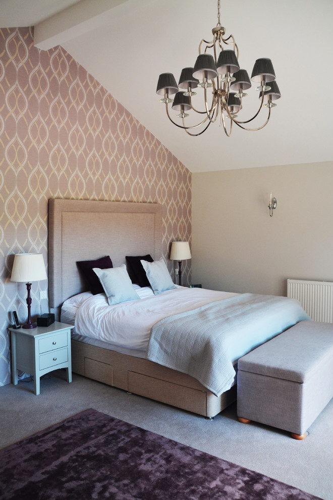 This is an example of a mid-sized transitional kids' bedroom in Hampshire with grey floor, pink walls and carpet.