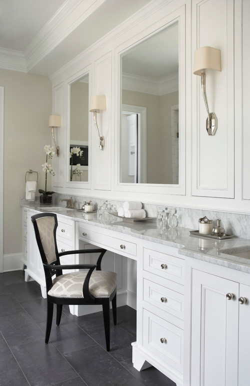 Gorgeous white bathroom with marble countertops and dark floors (Intense White)
